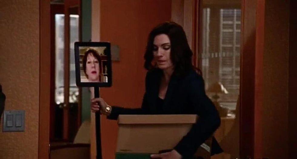 a still from the tv show "the good wife" depicting a hybrid work experiment. Hybrid Work